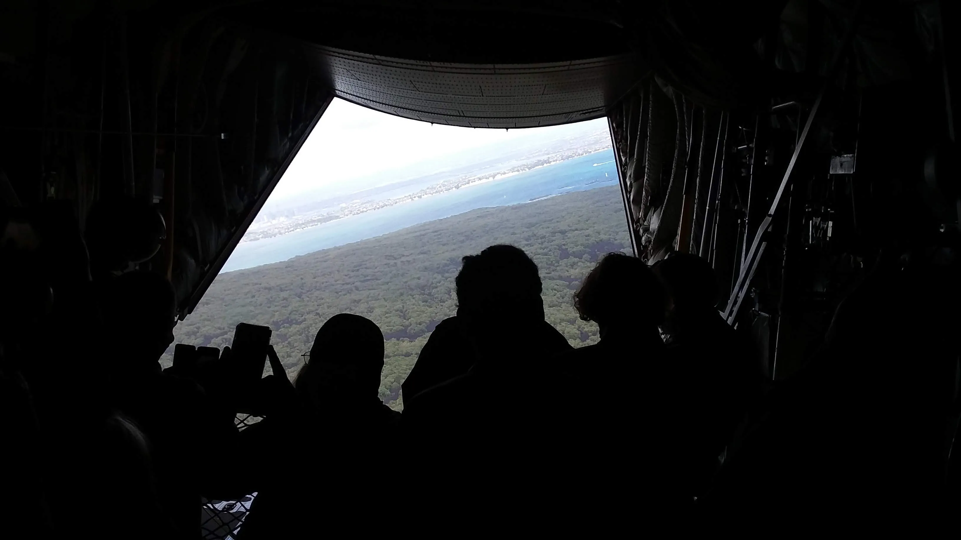 Looking out through the rear door of a Hercules aircraft